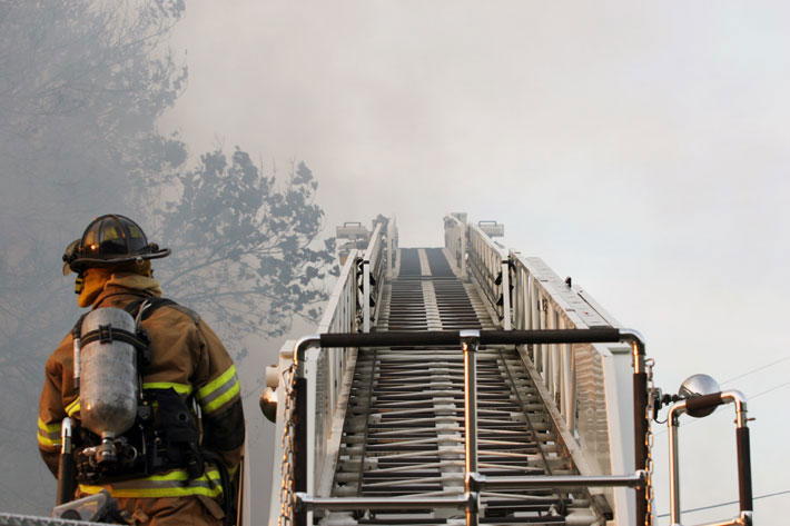 Firefighter with Hook and Ladder